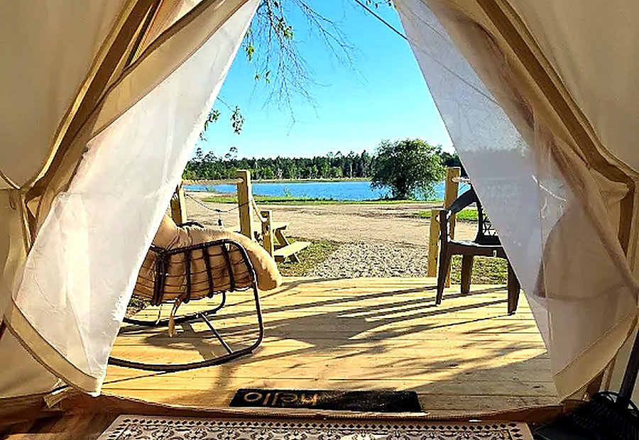 Furnished interior-ready glamping tent at Lake LaCroix in Bay St. Louis