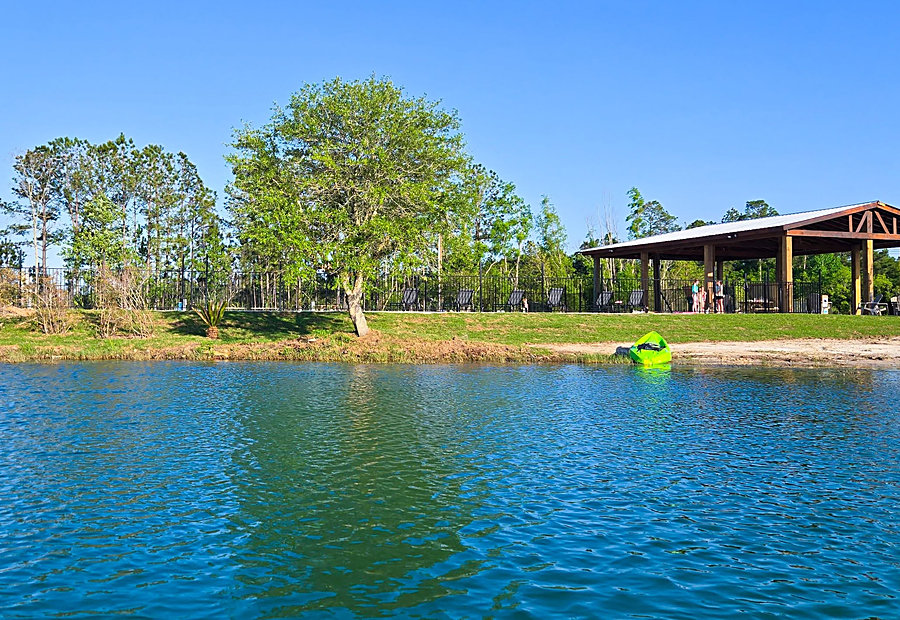 Lakeside pavilion gathering space at Lake LaCroix RV Resort in Bay St. Louis