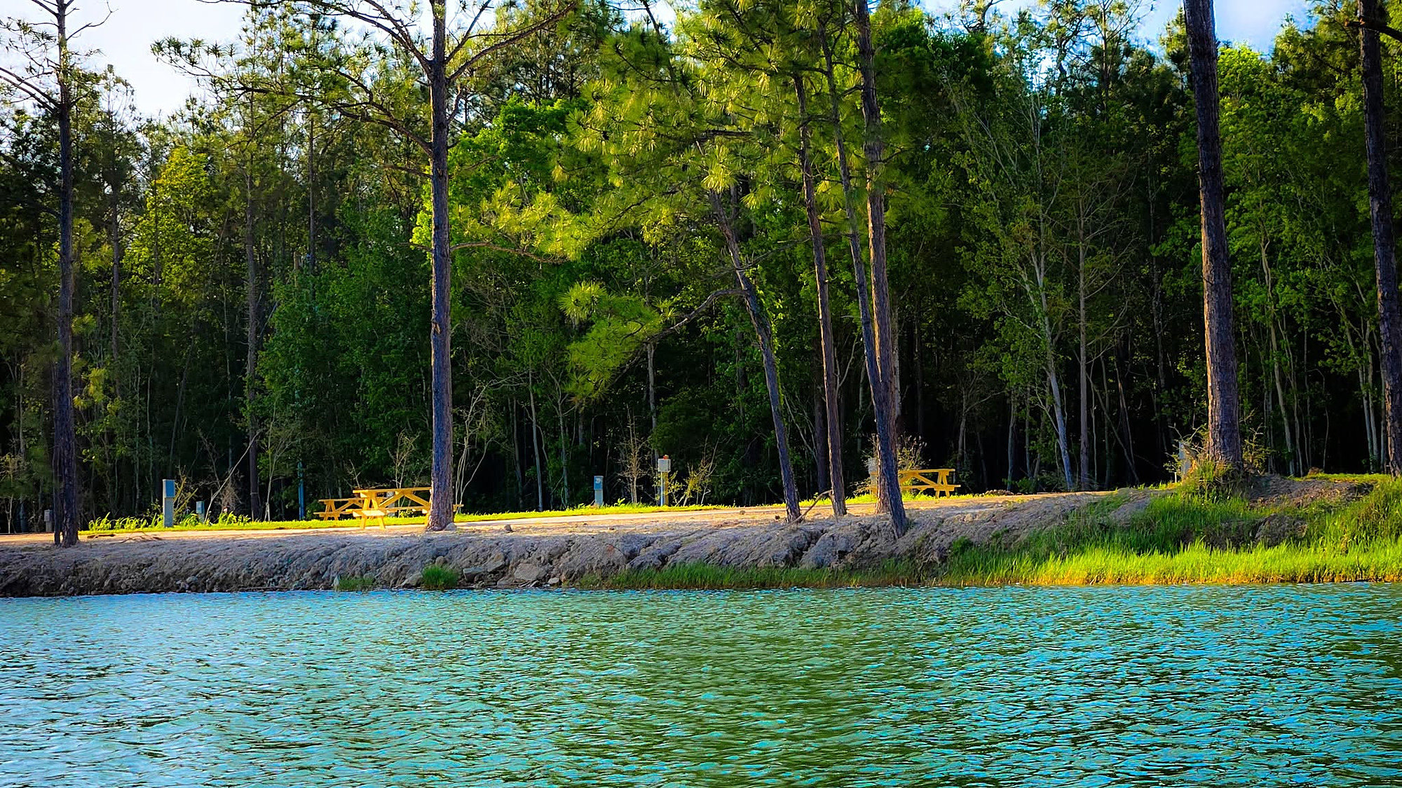 RV campsite at dusk beside the lake at Lake LaCroix in Bay St. Louis
