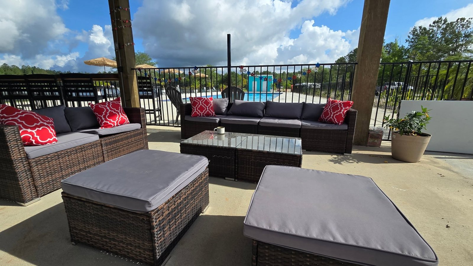 Outdoor lounge seating for guests at Lake LaCroix RV Resort