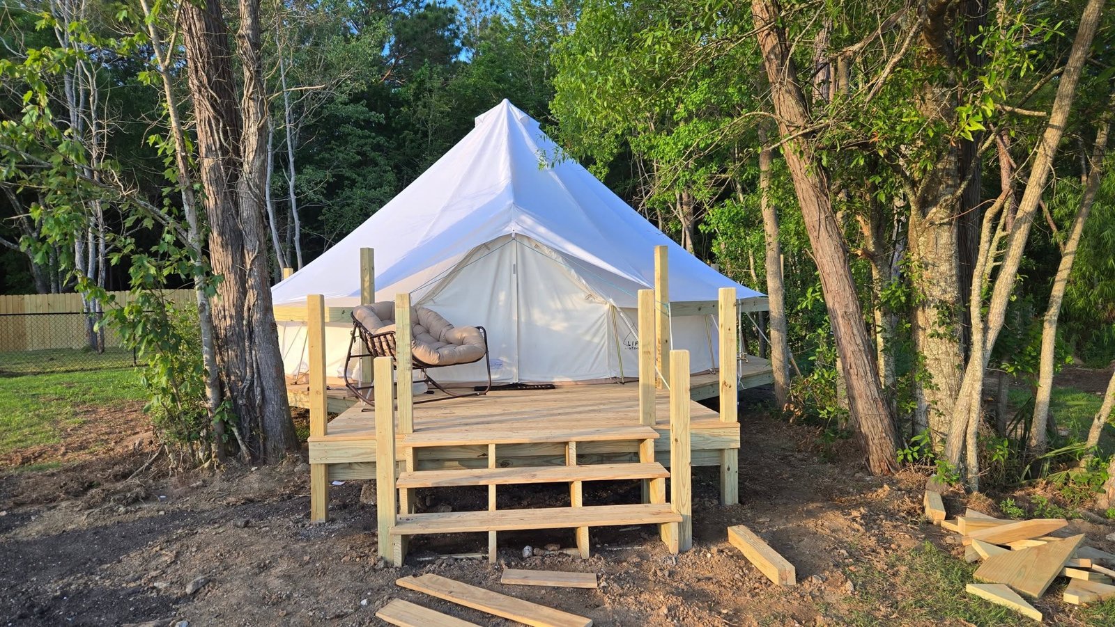 Glamping bell tent on a private wooden deck at Lake LaCroix RV Resort